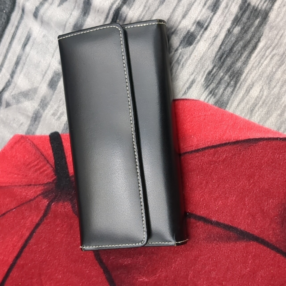 Jack George's black wallet